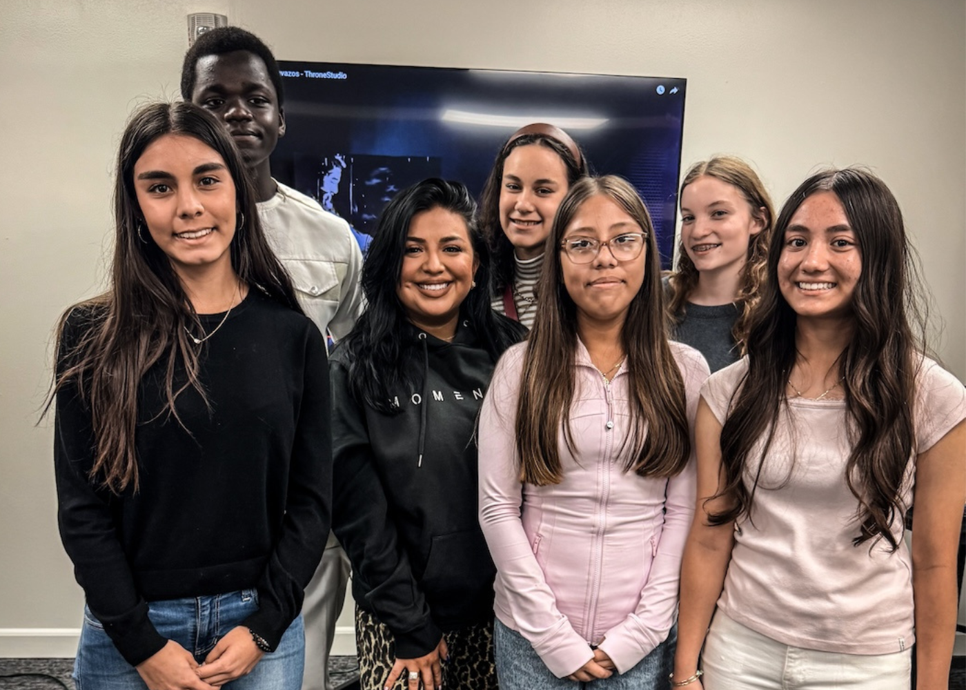 youth ministry three men and laughing two women walking side by side